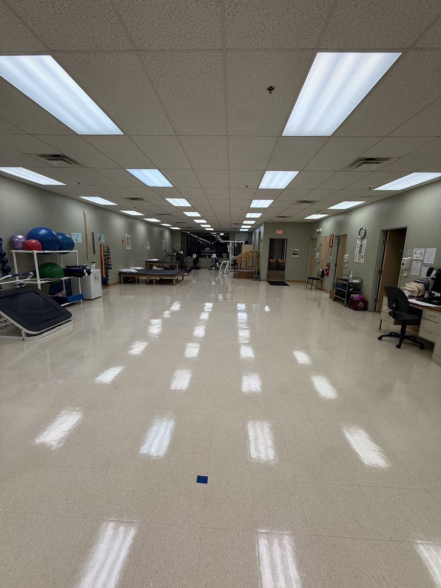 Physical therapy gym floor after burnishing in Lowell, MA